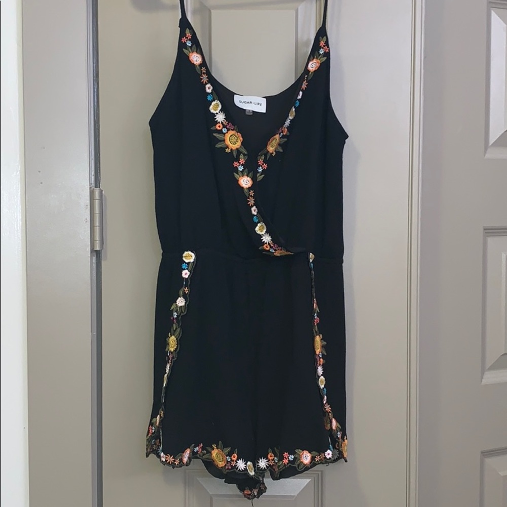 Fun embroidered black romper